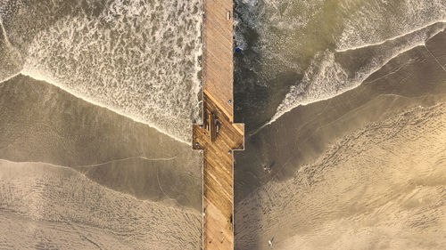 High angle view of land by sea