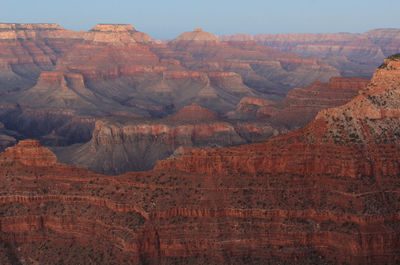 Scenic view of rocky mountains against clear sky