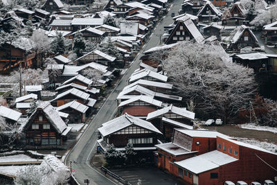 High angle view of houses in city during winter