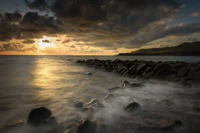 Scenic view of clavell pier against sky during sunset