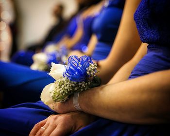 Close-up of woman hand holding flower