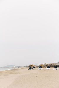 Scenic view of beach against clear sky