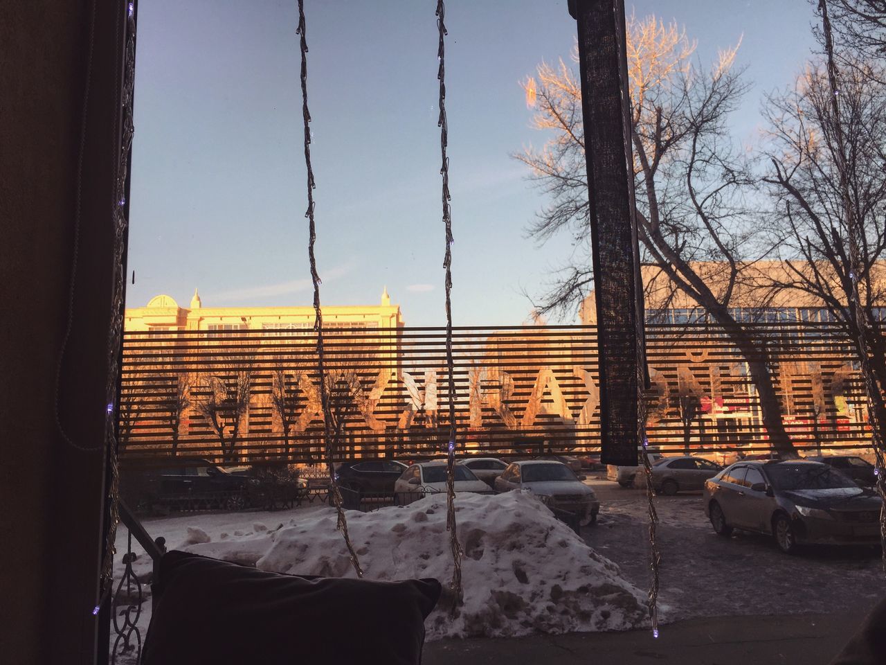 BUILT STRUCTURES AGAINST CLEAR SKY DURING SUNSET