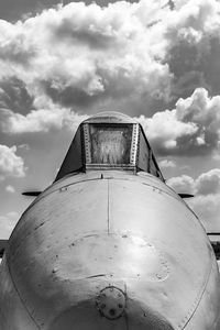 Low angle view of airplane against sky