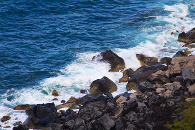 High angle view of rocks on beach