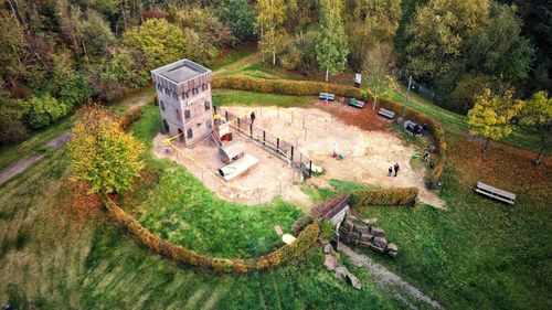 High angle view of road amidst trees