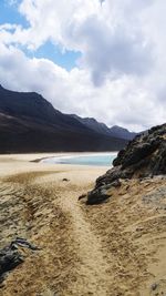 Scenic view of beach against sky