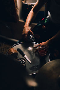 Midsection of man preparing food