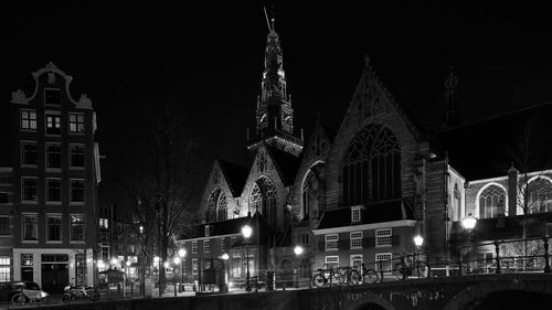 Low angle view of illuminated building at night