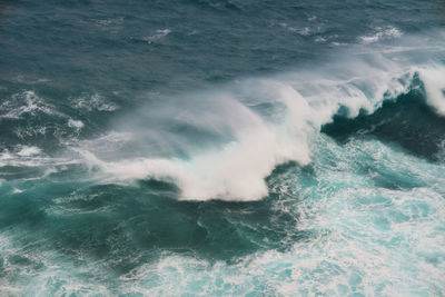 High angle view of waves in sea