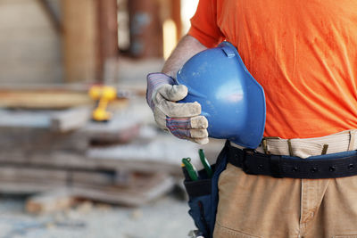 Midsection of man working