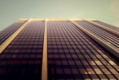 Low angle view of office building against sky