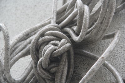 Close-up of rope tied on metal