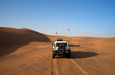 Scenic view of desert against clear sky