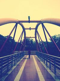 Footbridge with bridge in background