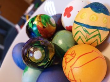 Close-up of multi colored eggs on table