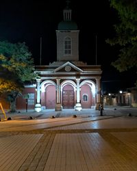 Illuminated historic building against sky at night