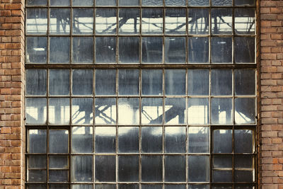 Close-up of window in cage