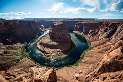 Panoramic view of rock formations against sky
