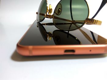 Close-up of smart phone on table