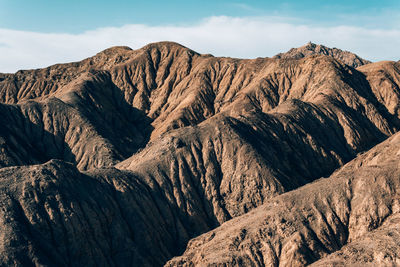 Scenic view of mountain range against sky