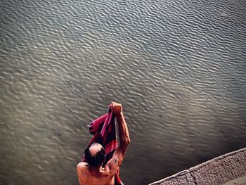 High angle view of man on boat in lake