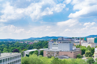 Buildings in city against sky