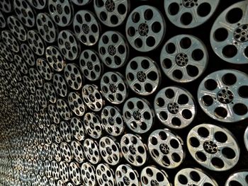 Detail shot of film reels mounted on wall