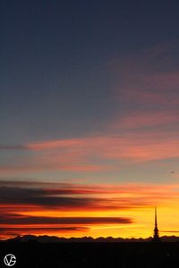 Scenic view of dramatic sky during sunset