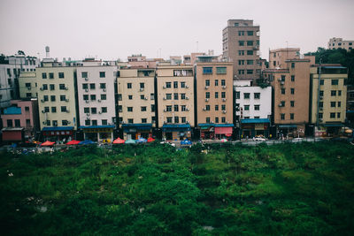 View of residential buildings against clear sky