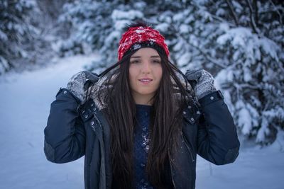 Woman wearing winter gear in snow