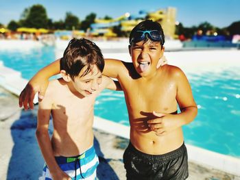 Friends enjoying in swimming pool