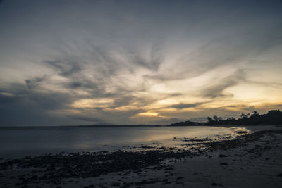 Scenic view of sea against sky at sunset