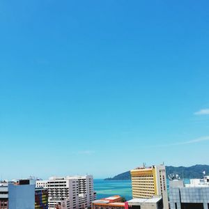 Buildings against blue sky