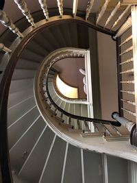 Low angle view of spiral staircase in building