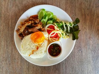 High angle view of salad in bowl on table