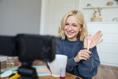 Young woman using mobile phone