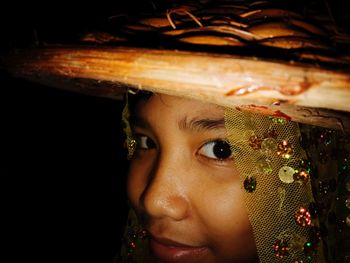 Close-up portrait of girl looking away