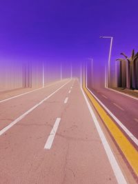 Empty road against clear sky