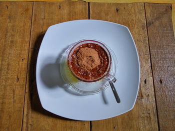 High angle view of coffee cup on table