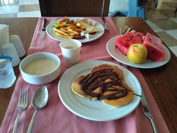 High angle view of breakfast served on table