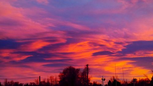 Low angle view of cloudy sky at sunset