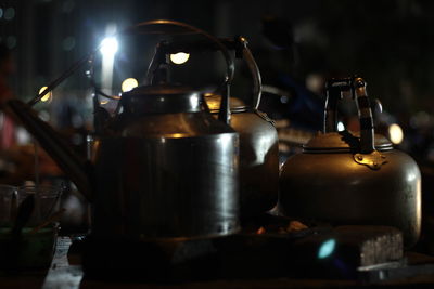 Close-up of tea kettle on stove outdoors