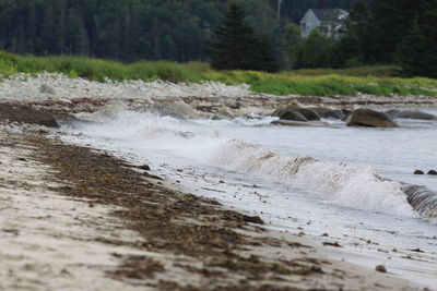 Waves on the sand at the beach.