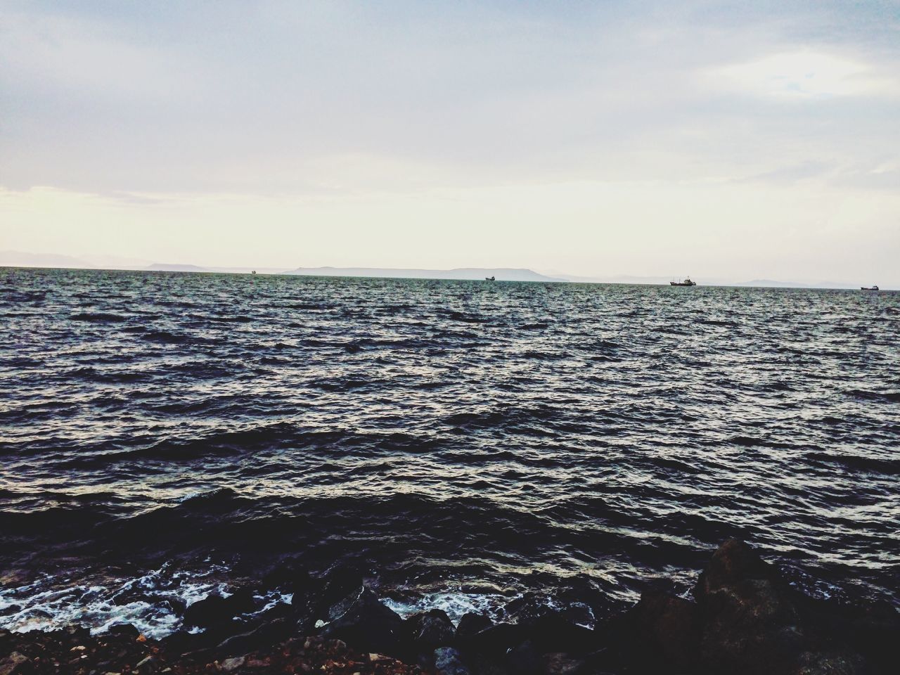 sea, water, horizon over water, sky, tranquil scene, waterfront, scenics, tranquility, rippled, beauty in nature, nature, seascape, cloud - sky, idyllic, cloud, blue, day, outdoors, no people, remote