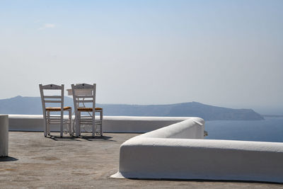 Lifeguard chair on beach against clear sky