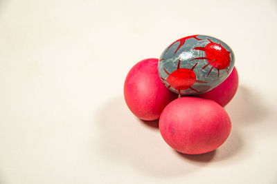 Close-up of multi colored candies on white background