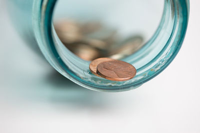 Close-up of coins on table