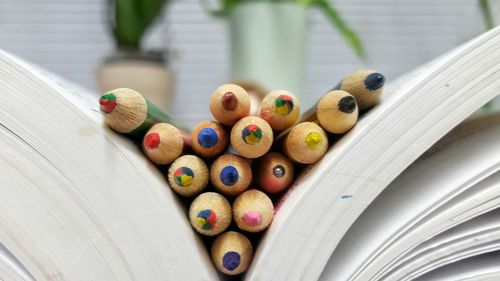 Detail shot of colorful pencils in book