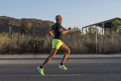 A old man doing sports